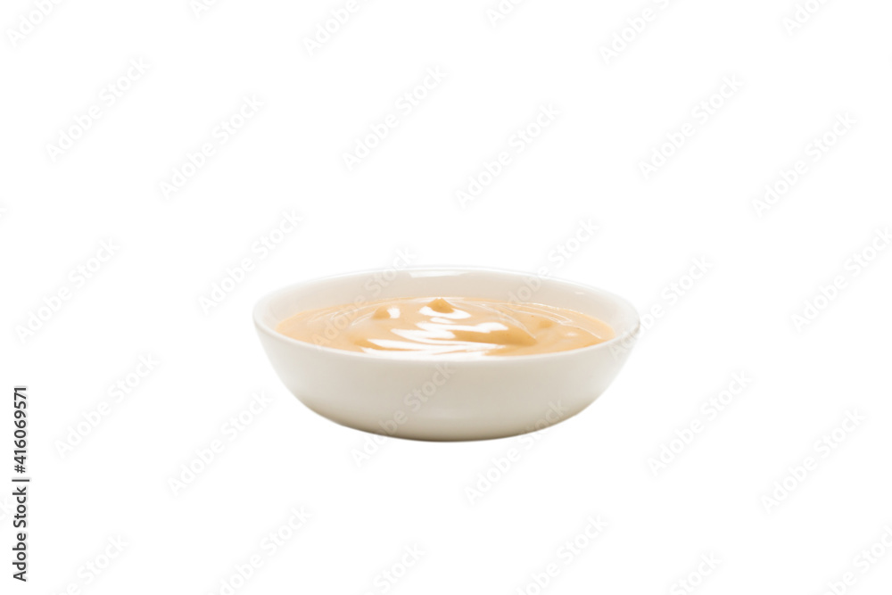 Mushroom sauce in a bowl isolated on white background.