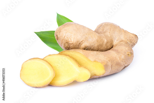Fresh ginger root with cut slice isolated on white background