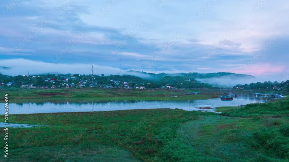 Morning atmosphere in the rainy season. The mist flows through the mountains. Sangkhlaburi District, Kanchanaburi Province, Thailand. Morning atmosphere in the rainy season. The mist flows through the mountains. Sangkhlaburi District, Kanchanaburi Province, Thailand.