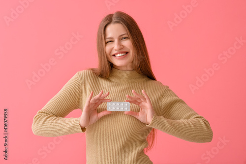 Beautiful young woman with ...