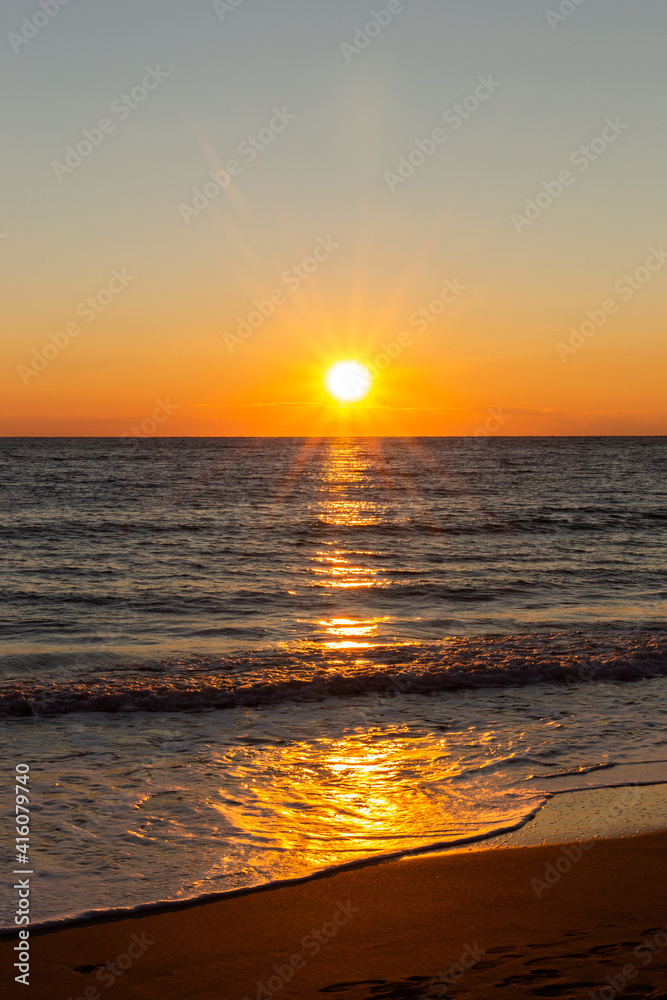 Cloudless sunset over ocean. Natural colors.