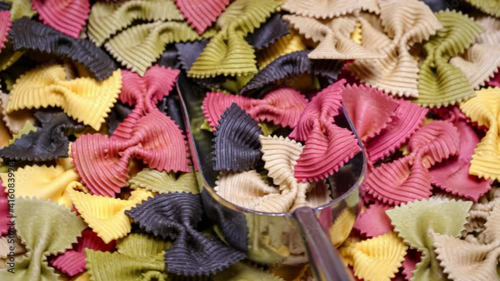 Colored Farfalle Pasta bow tie pasta background. Colored Farfalle Pasta bow tie pasta background.