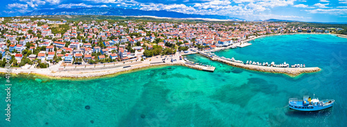 Town of Novalja beach and waterfront on Pag island aerial panoramic view
