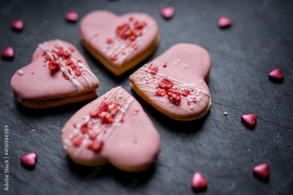 pink heart shaped short bread scotch butter cookies bisquits cakes for wedding, valentines, mothers day love dessert with freeye dried strawberries pink heart shaped short bread scotch butter cookies bisquits cakes for wedding, valentines, mothers day love dessert with freeye dried strawberries