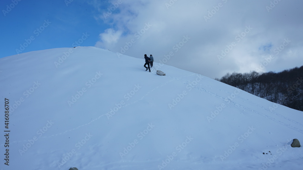 skier on the top of the mountain skier on the top of the mountain