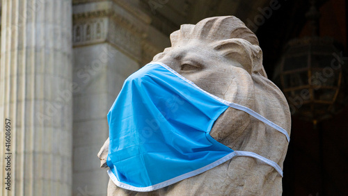 New York Public Library lion statue given a mask to promote mask wearing during the Covid-19 pandemic