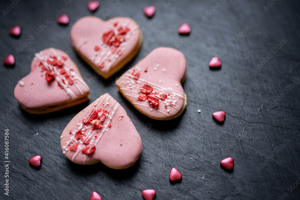 pink heart shaped short bread scotch butter cookies bisquits cakes for wedding, valentines, mothers day love dessert with freeye dried strawberries 