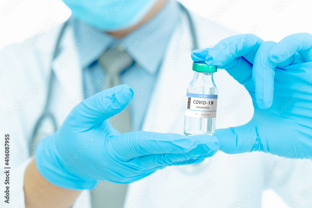vaccines fight against virus covid-19 corona virus, doctor or scientist in laboratory holding a syringe with liquid vaccines. vaccines fight against virus covid-19 corona virus, doctor or scientist in laboratory holding a syringe with liquid vaccines.