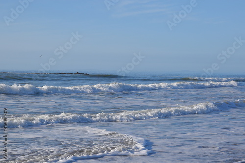 large waves hitting borth beach