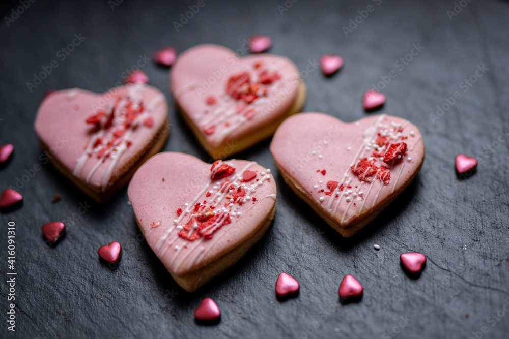 pink heart shaped short bread scotch butter cookies bisquits cakes for wedding, valentines, mothers day love dessert with freeye dried strawberries pink heart shaped short bread scotch butter cookies bisquits cakes for wedding, valentines, mothers day love dessert with freeye dried strawberries