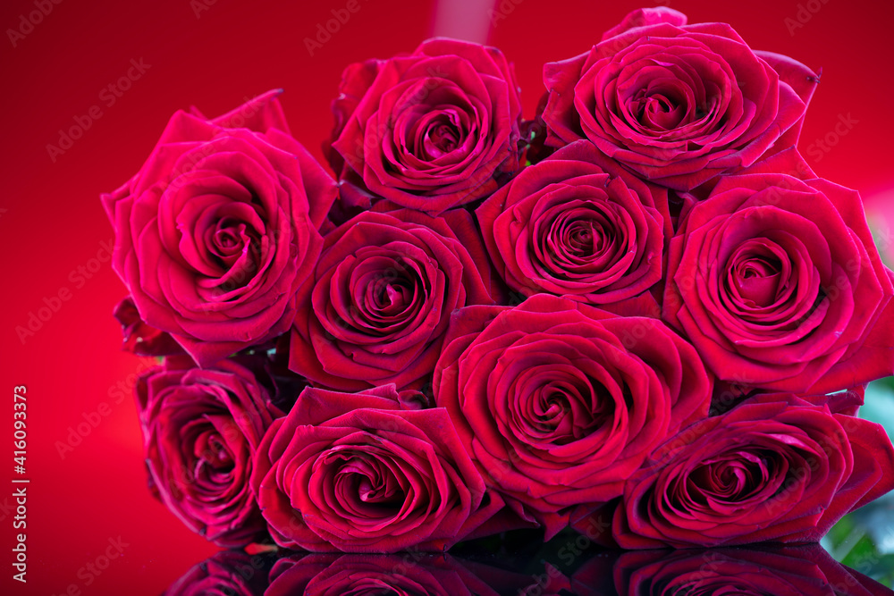 Bunch of roses on the bokeh background. Women’s day gift. Bunch of roses on the bokeh background. Women’s day gift.