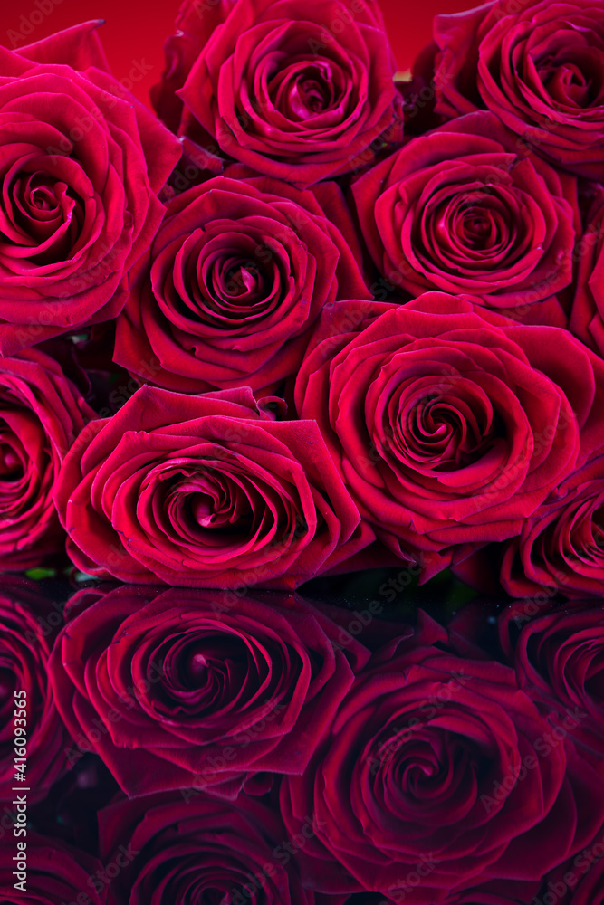 Bunch of roses on the bokeh background. Women’s day gift. 