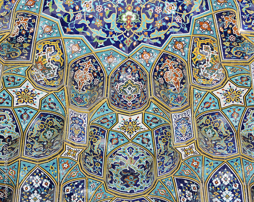 Mosque  muqarnas, Tehran, Iran (muqarnas is a complex geometrical interlacing of components to produce three-dimensional surface) © Baharlou