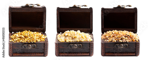 Fotografie Gold Frankincense and Myrrh in three Chests on a White Background