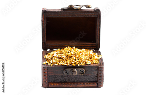 Pieces of Gold in a Treasure Chest on a White Background