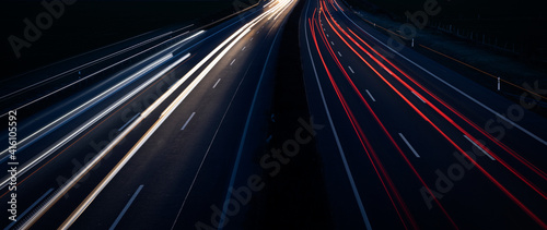 Night Autobahn, highway. Light lines from cars.
