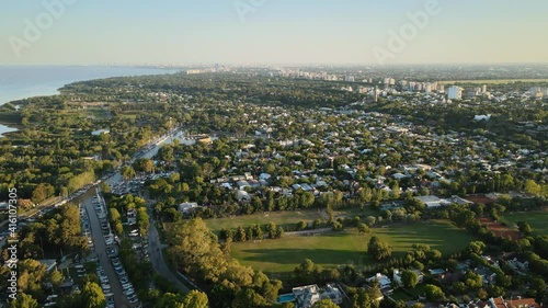 Aerial establishing shot of San Isidro coastal community and nautical clubs. Dolly in photo