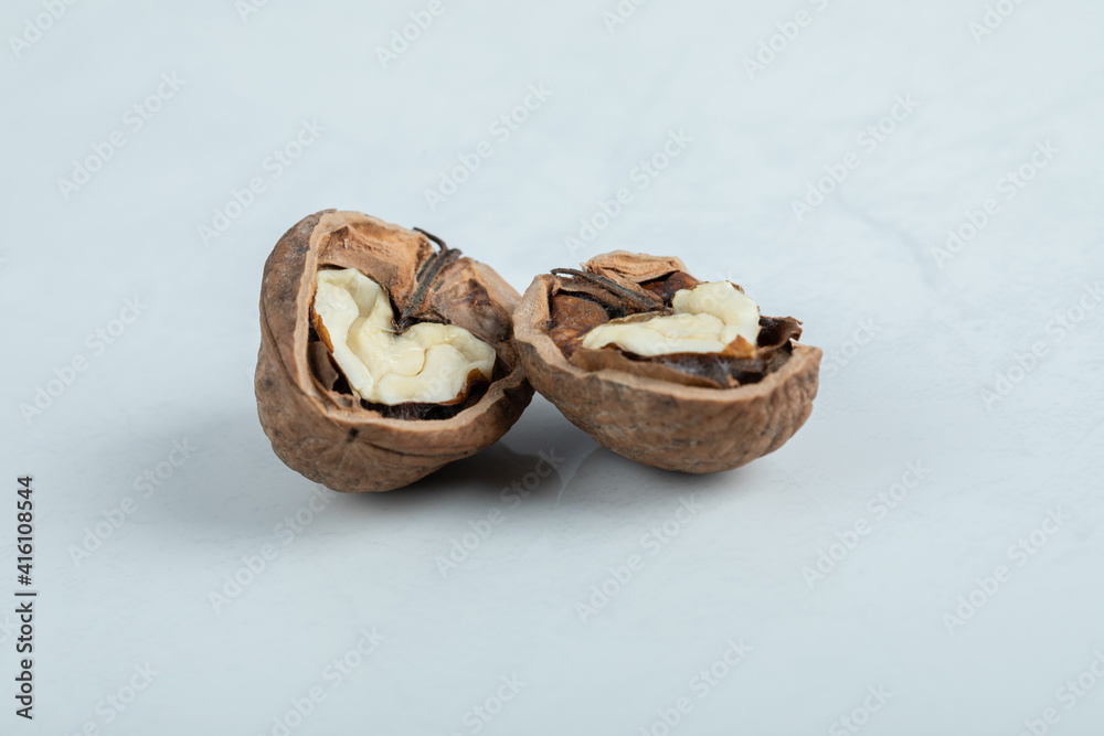Cracked walnut isolated on the white background Cracked walnut isolated on the white background
