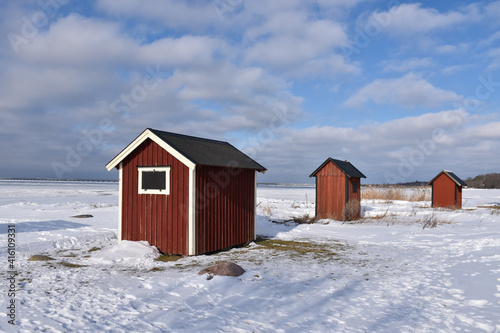Red small fishing cabins