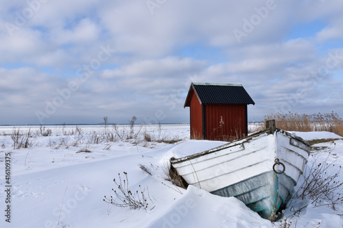 Old rowing boat by the coast
