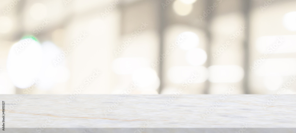 marble table top with blurred abstract cafe restaurant interior background marble table top with blurred abstract cafe restaurant interior background