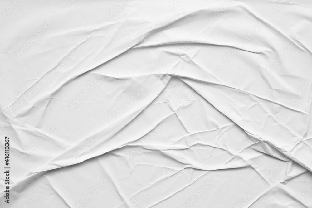 Obraz premium Blank white crumpled and creased paper poster texture background