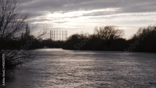 A gas holder close to a river