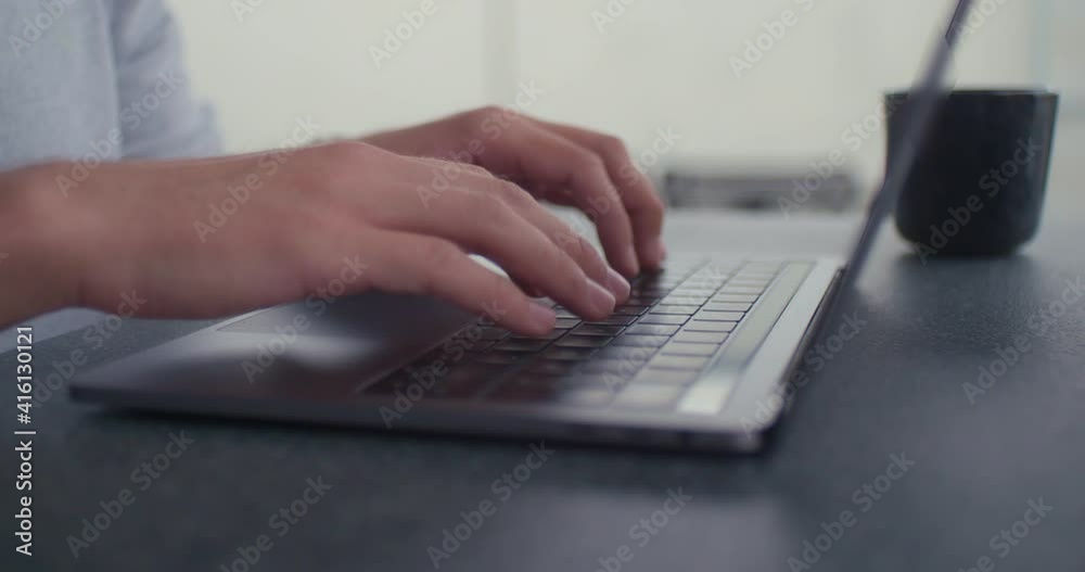 Close up of writing with laptop Close up of writing with laptop