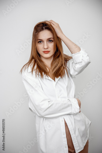 Young woman looking at the camera model isolated background. Beautiful elegant woman. Jewellery advertising concept. Close up portrait. Businesswoman confident portrait.