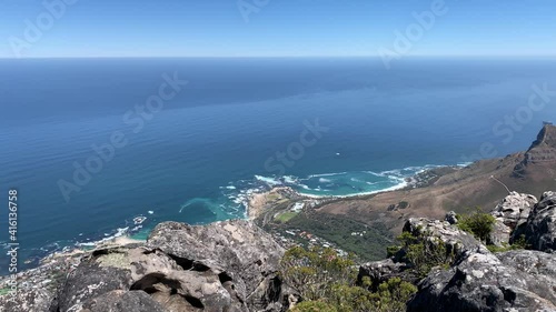 Aerial scenic view of Clifton beach , Camps Bay and Bantry Bay of the vast Atlantic Ocean seaboard  on the Cape Peninsula taken from Table Mountain