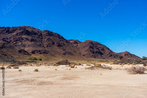 Mountain range in the Mojave Desert with a dry lake bed