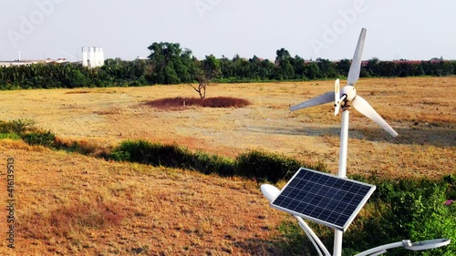 Using solar cells to store solar energy to make the lampwork at night. And the use of wind turbines to store energy