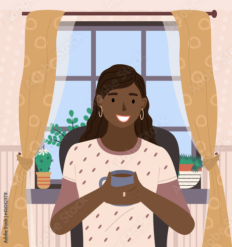 Nice happy dark skinned woman sitting near the window vector illustration. Smiling girl drinks tea . Female character in ordinary clothes with a cup of coffee sitting on chair in living room interior