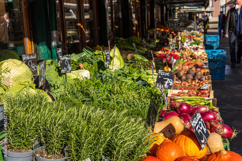 Photography Fresh variety of herb plants, vegetables and fruits in a food farmer's market stall ready for sale