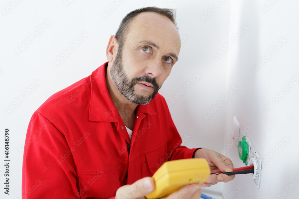 an electrician measuring earth resistance an electrician measuring earth resistance