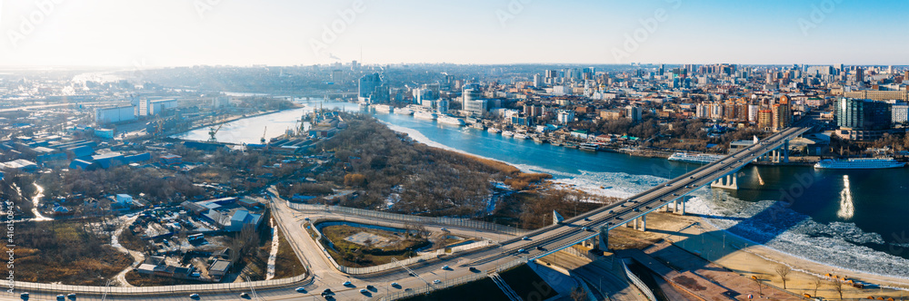 Voroshilovskiy Bridge above Don river and Rostov On Don aerial panoramic view of beautiful winter Russian city.