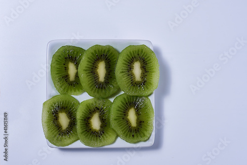 Rectangular plate with cut kiwifruit