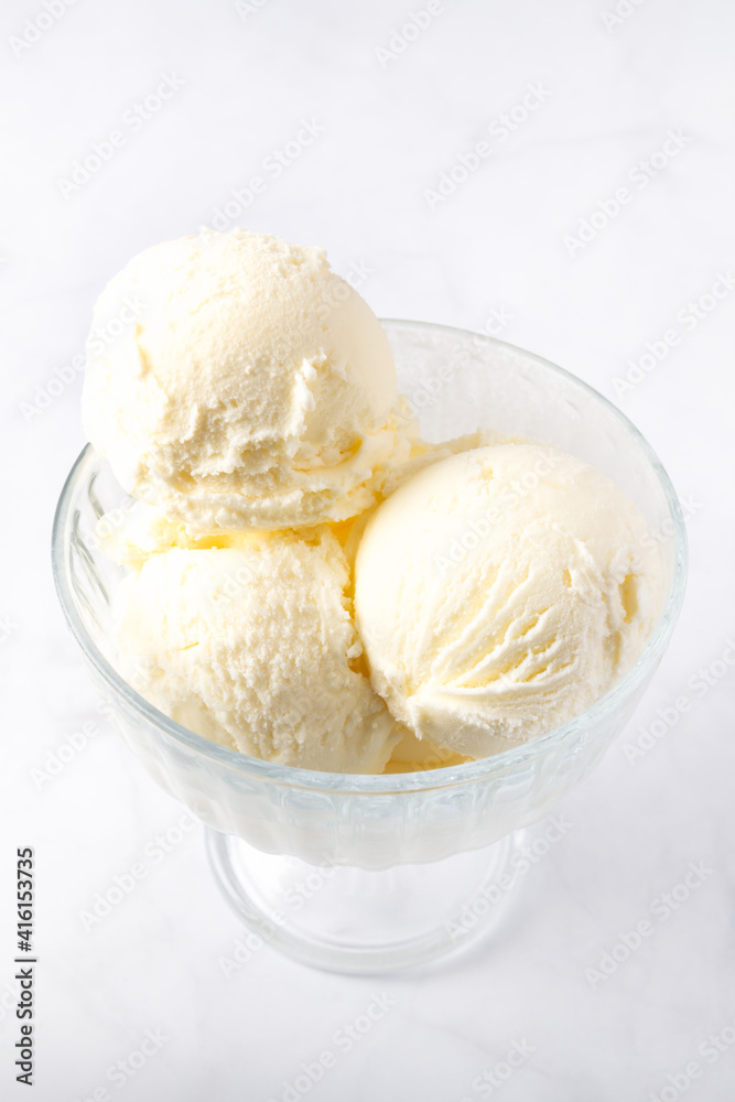 Vanilla Ice Cream Scoops with raspberries and chocolate sticks, easy dessert at home Vanilla Ice Cream Scoops with raspberries and chocolate sticks, easy dessert at home