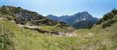 ruins of barracks from the first world war on the slopes of Mount Jof di Miezegnot in the Julian Alps in Italy