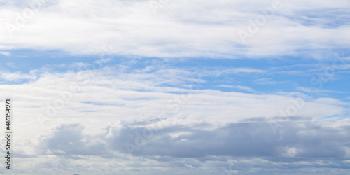 Blue sky with white clouds on a daytime, natural panorama