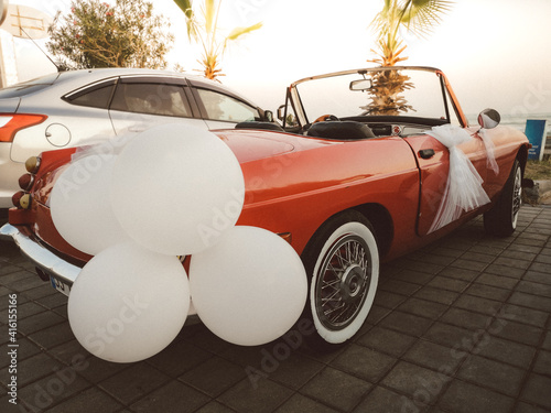 Red classic wedding car