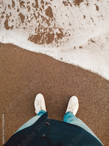 Standing by the sea shore
