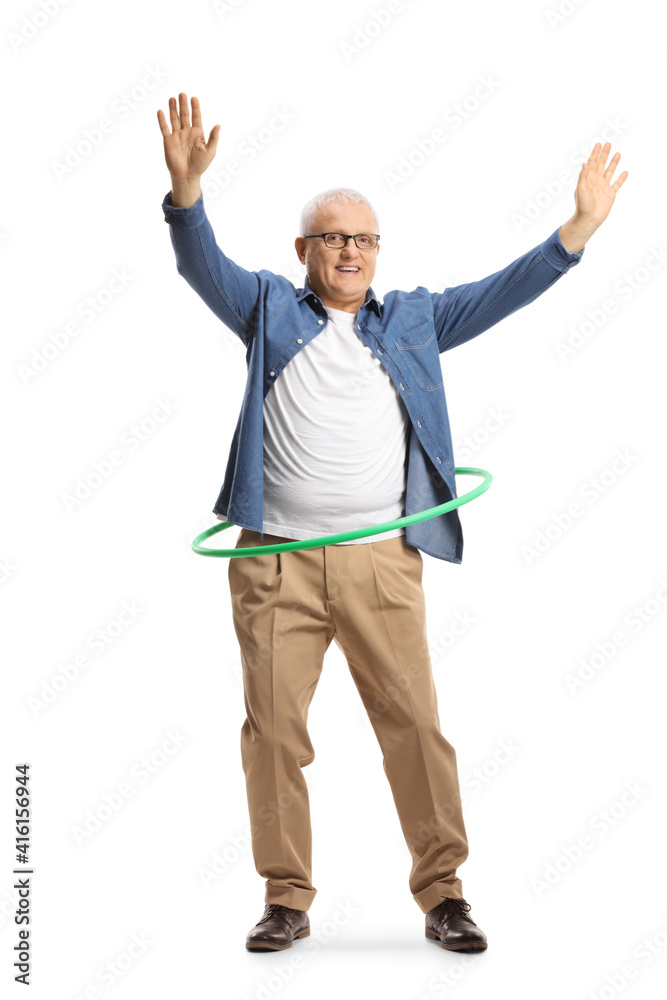 Full length portrait of a cheerful mature man spinning a hula hoop Full length portrait of a cheerful mature man spinning a hula hoop