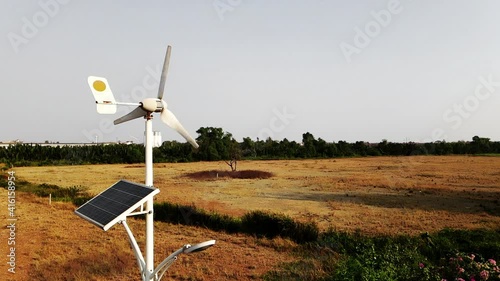 Using solar cells to store solar energy to make the lampwork at night. And the use of wind turbines to store energy