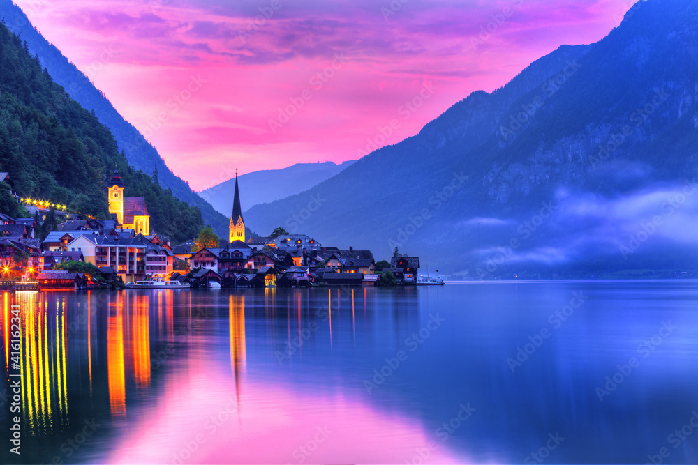 Hallstatt idylic mountain town, in the Alps Austria, at dusk
