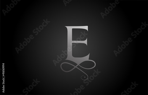 E black and white elegant monogram ornament alphabet letter logo icon for luxury. Business and corporate brading design for business products photo