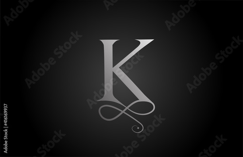 K black and white elegant monogram ornament alphabet letter logo icon for luxury. Business and corporate brading design for business products photo