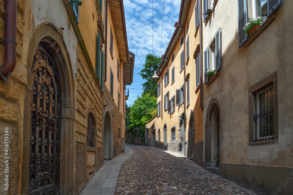 View of the old historic streets in Bergamo. Is a city in the alpine Lombardy region of northern Italy.