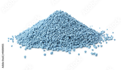 Pile of granular mineral fertilizer isolated on white photo