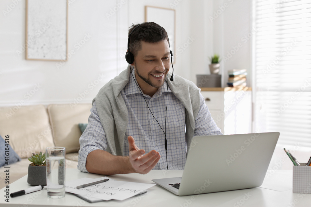 Teacher conducting online lesson at home during COVID-19 quarantine